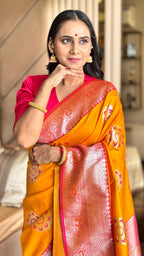 Orange luxurious banarasi silk saree with zari weaving work