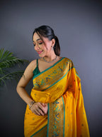 Yellow colour paithani silk saree with zari weaving work