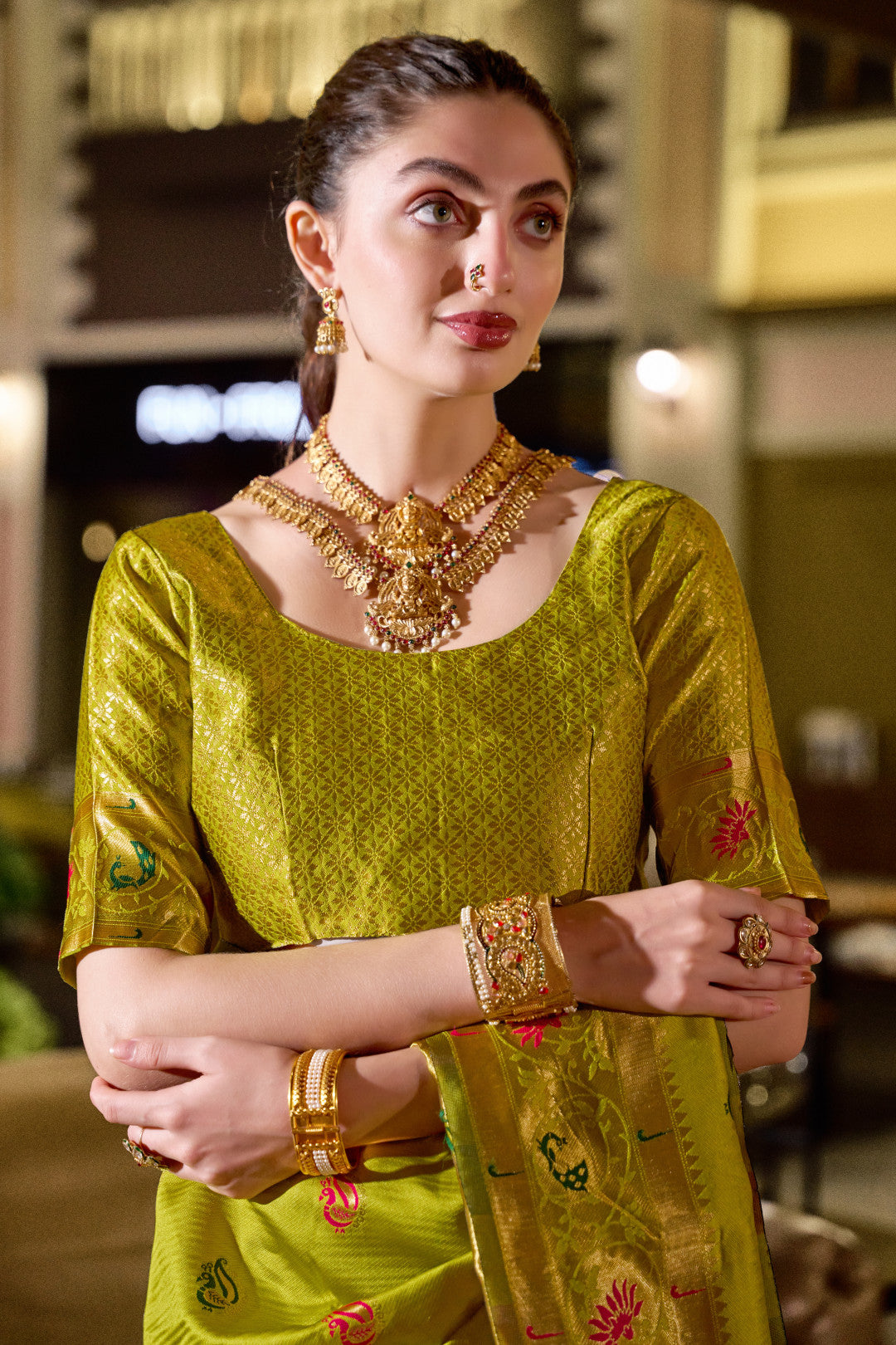 Traditional parrot green paithani silk saree with zari weaving work