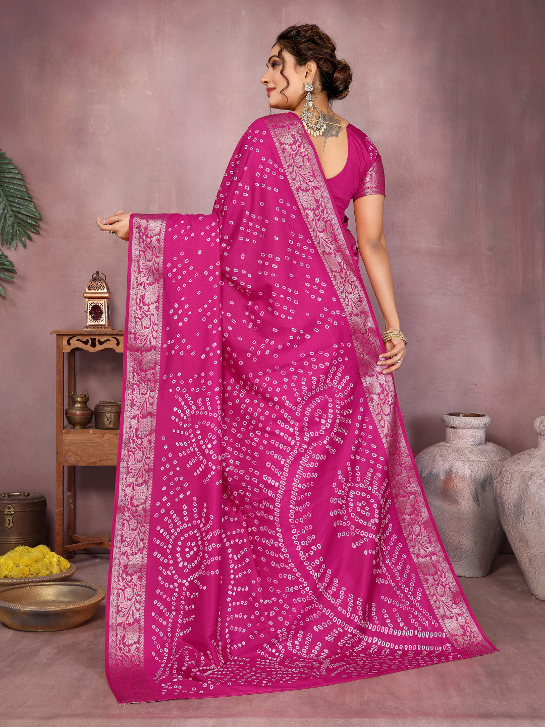 Pink colour hand bandhej bandhani saree with zari weaving work