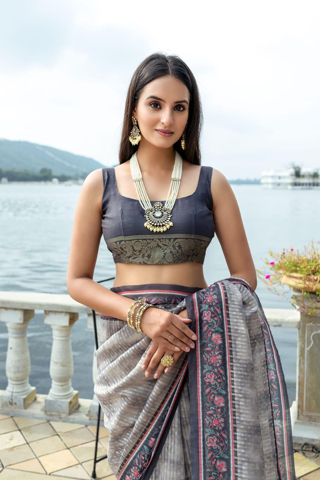 Gray color soft tussar silk saree with zari weaving work