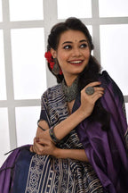 Purple color tussar silk saree with printed work