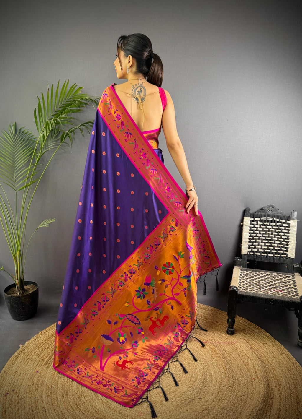 Purple colour paithani silk saree with zari weaving work