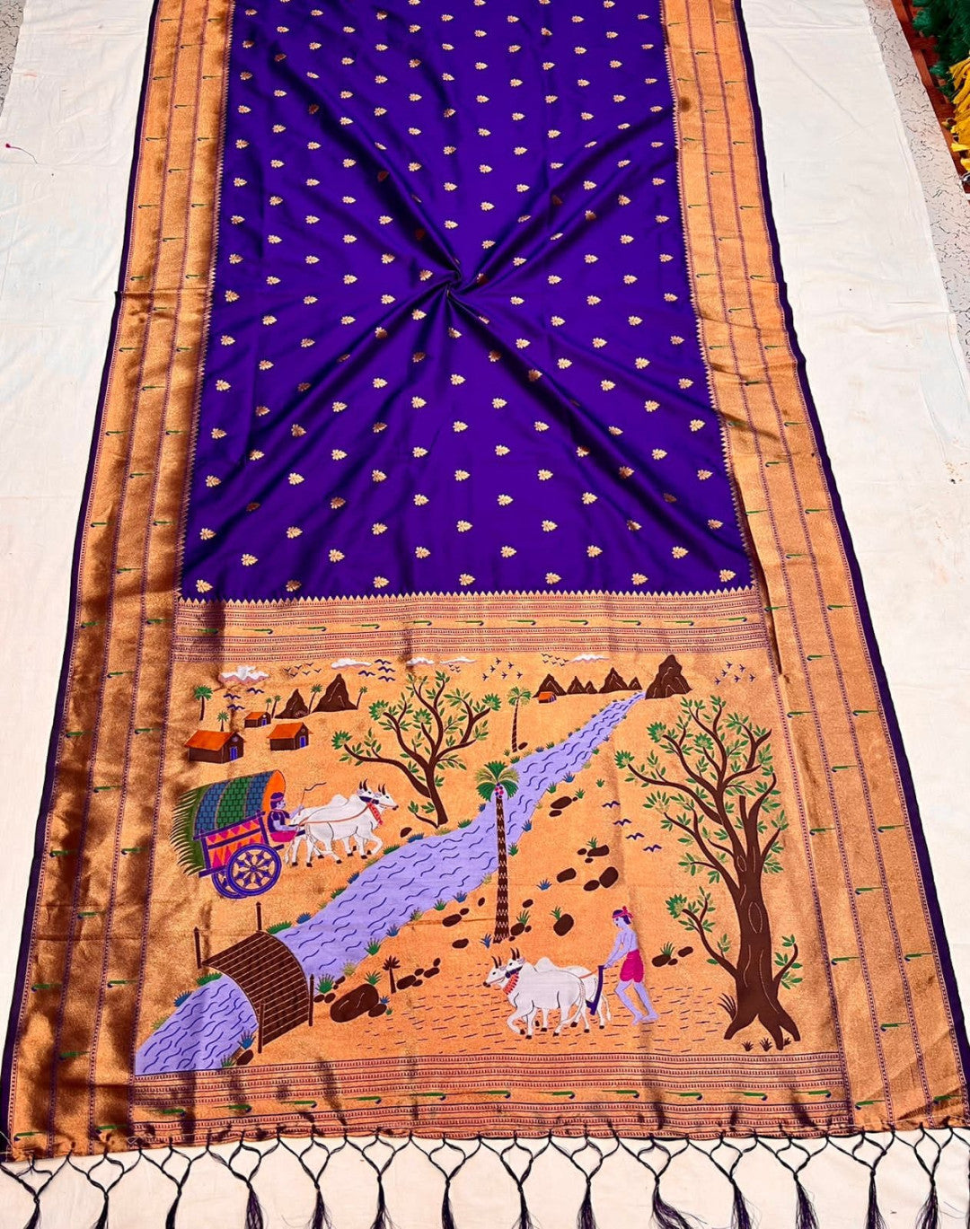 Violet color paithani silk saree with zari weaving work