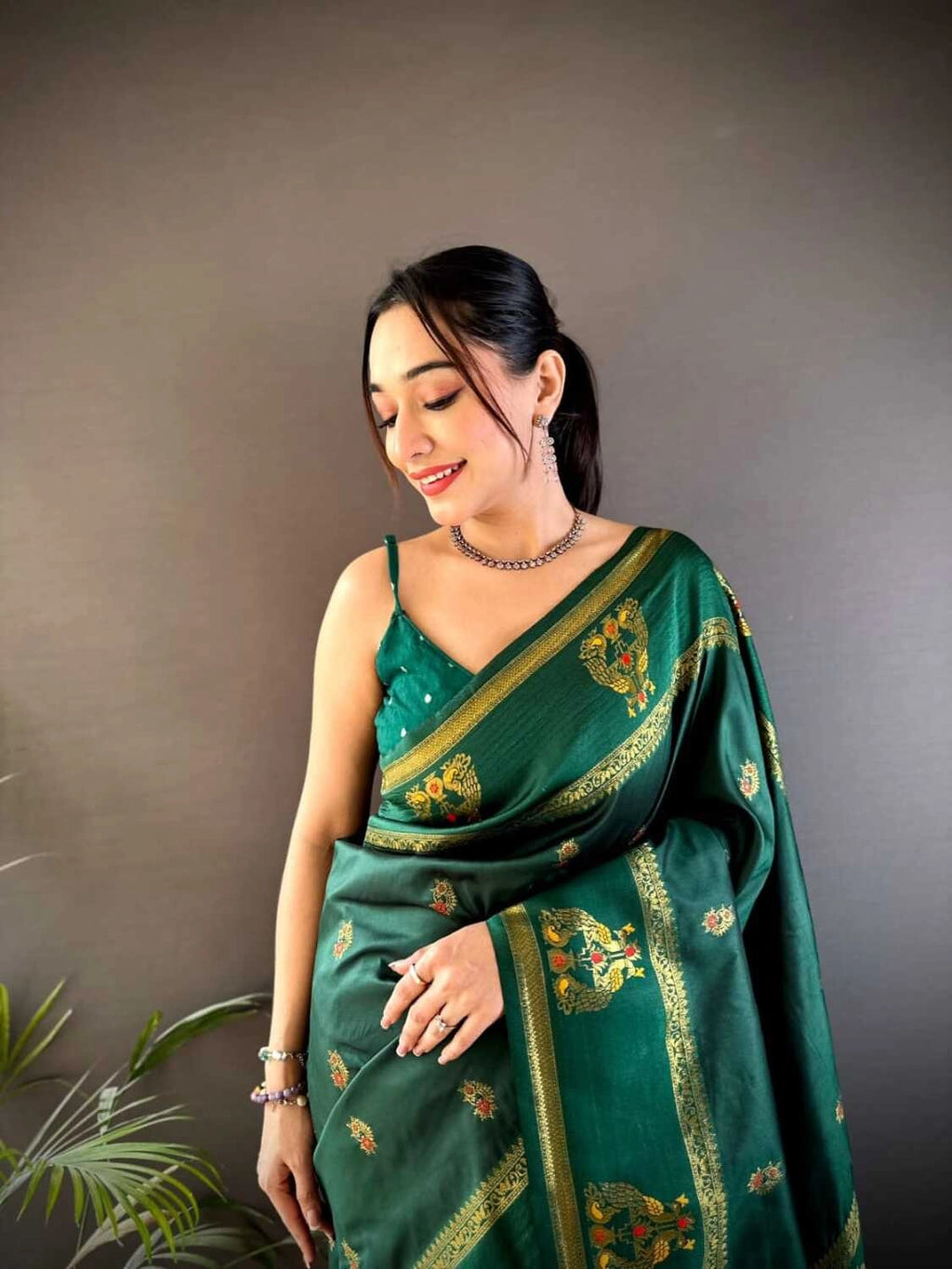 Green traditional paithani silk saree with meenakari zari weaving work