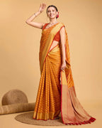 Orange color kanchipuram silk saree with zari woven work