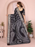 Black colour hand bandhej bandhani saree with zari weaving work