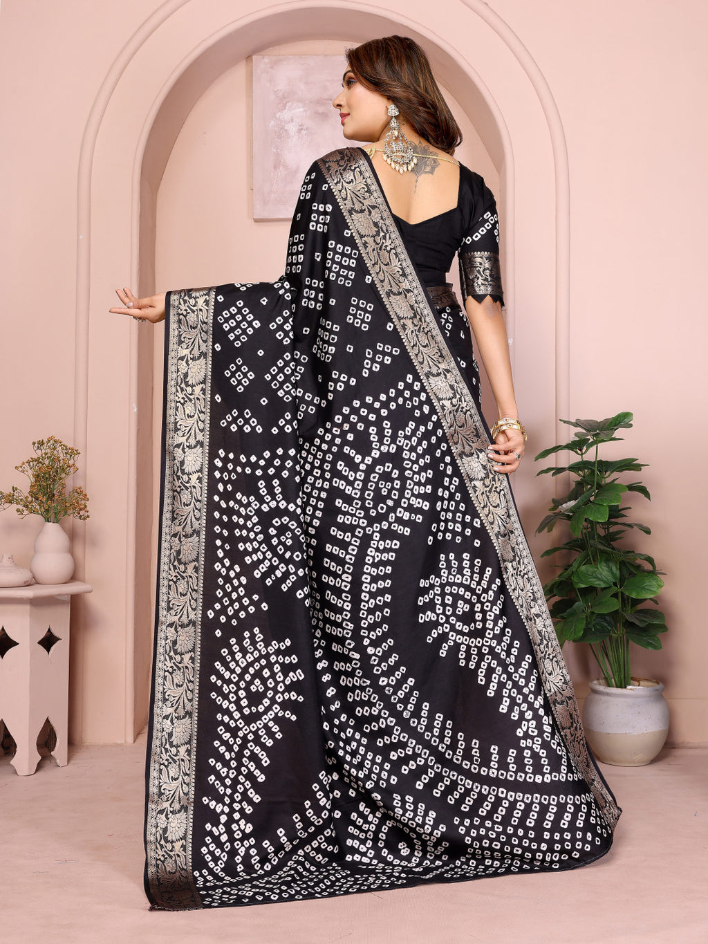 Black colour hand bandhej bandhani saree with zari weaving work