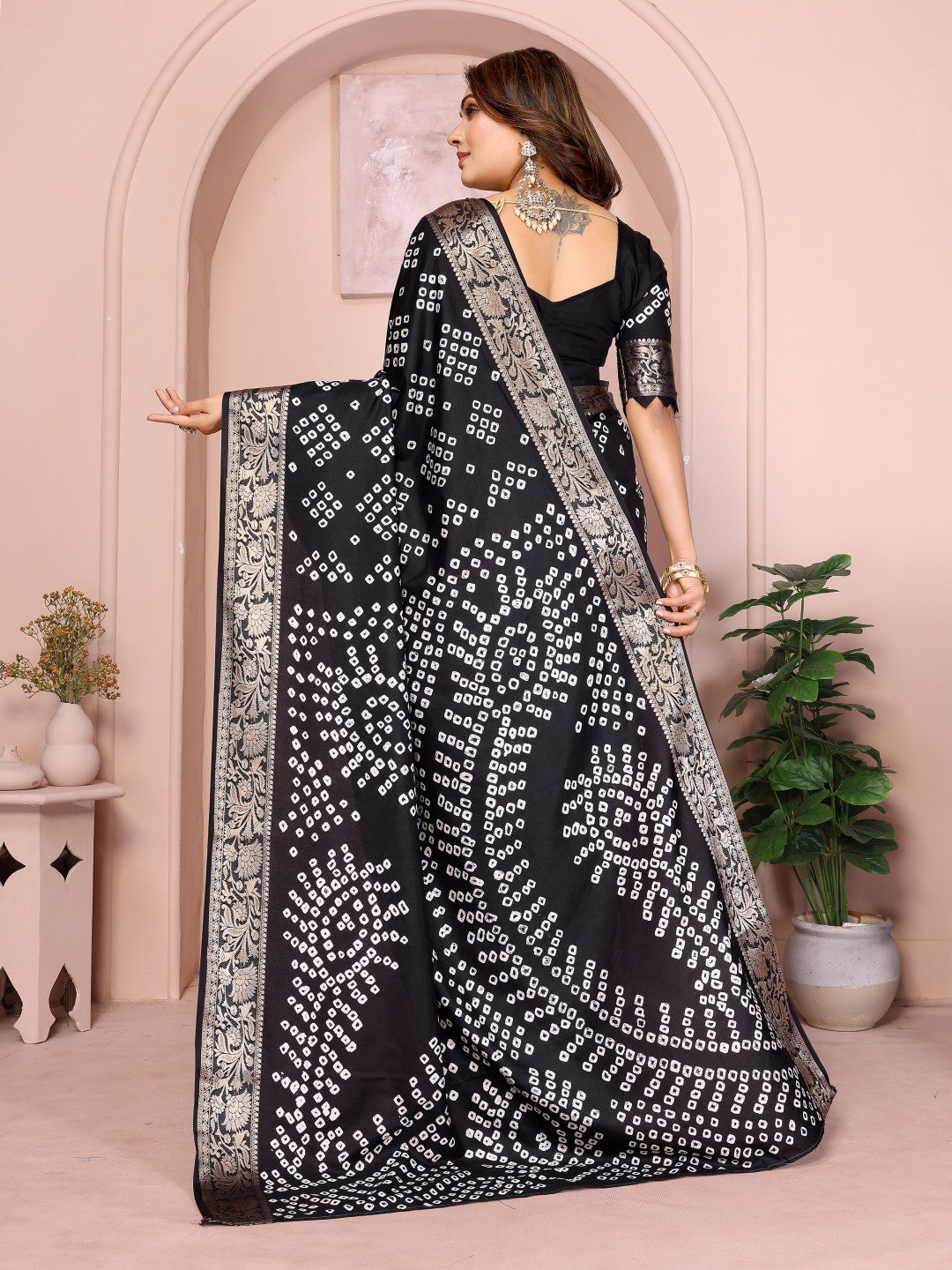 Black colour hand bandhej bandhani saree with zari weaving work