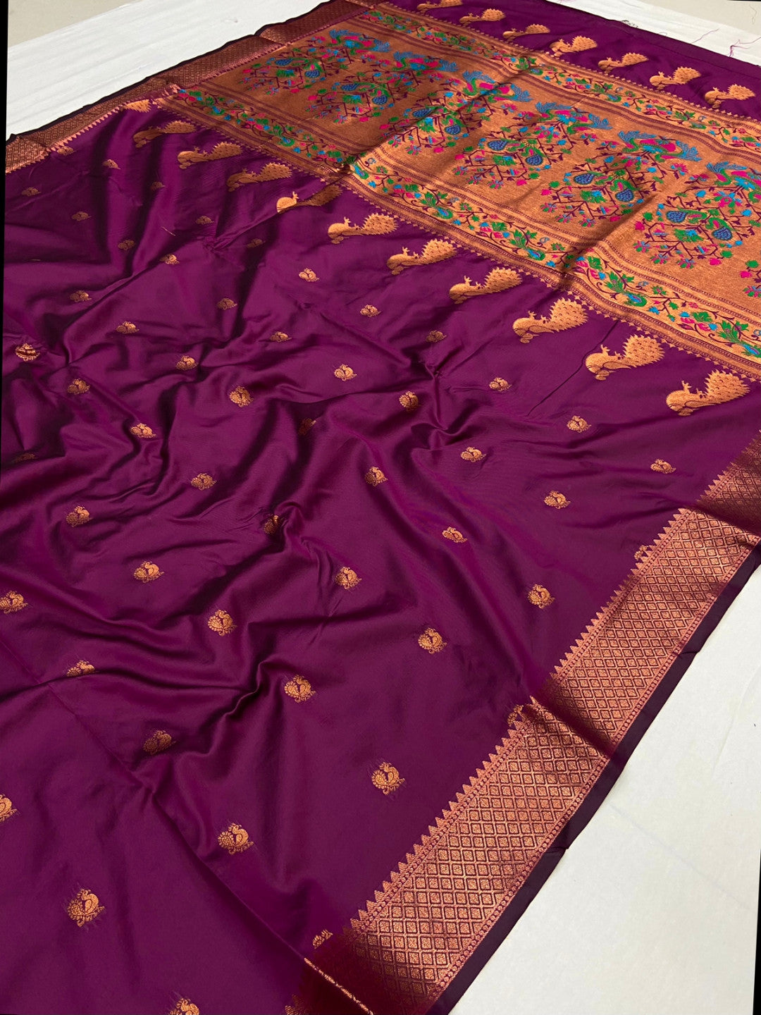 Magenta color paithani silk saree with zari weaving work