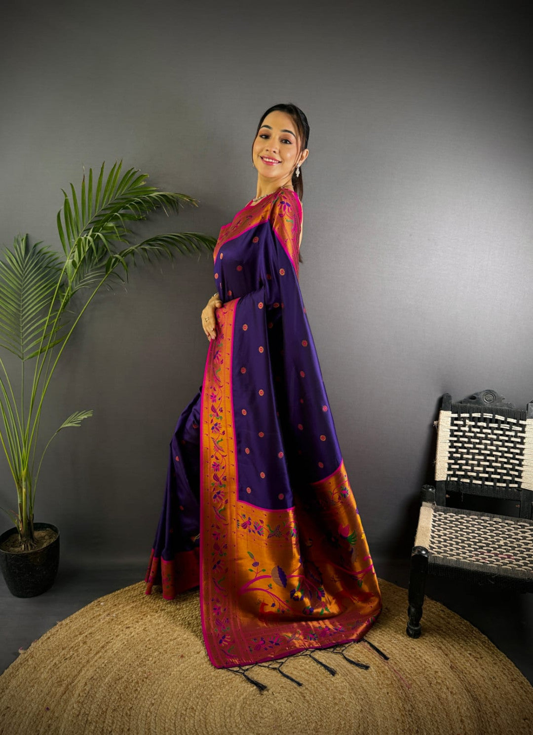 Purple colour paithani silk saree with zari weaving work