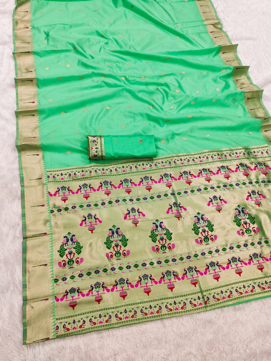 Sea green lichi silk paithani saree with copper zari weaving work