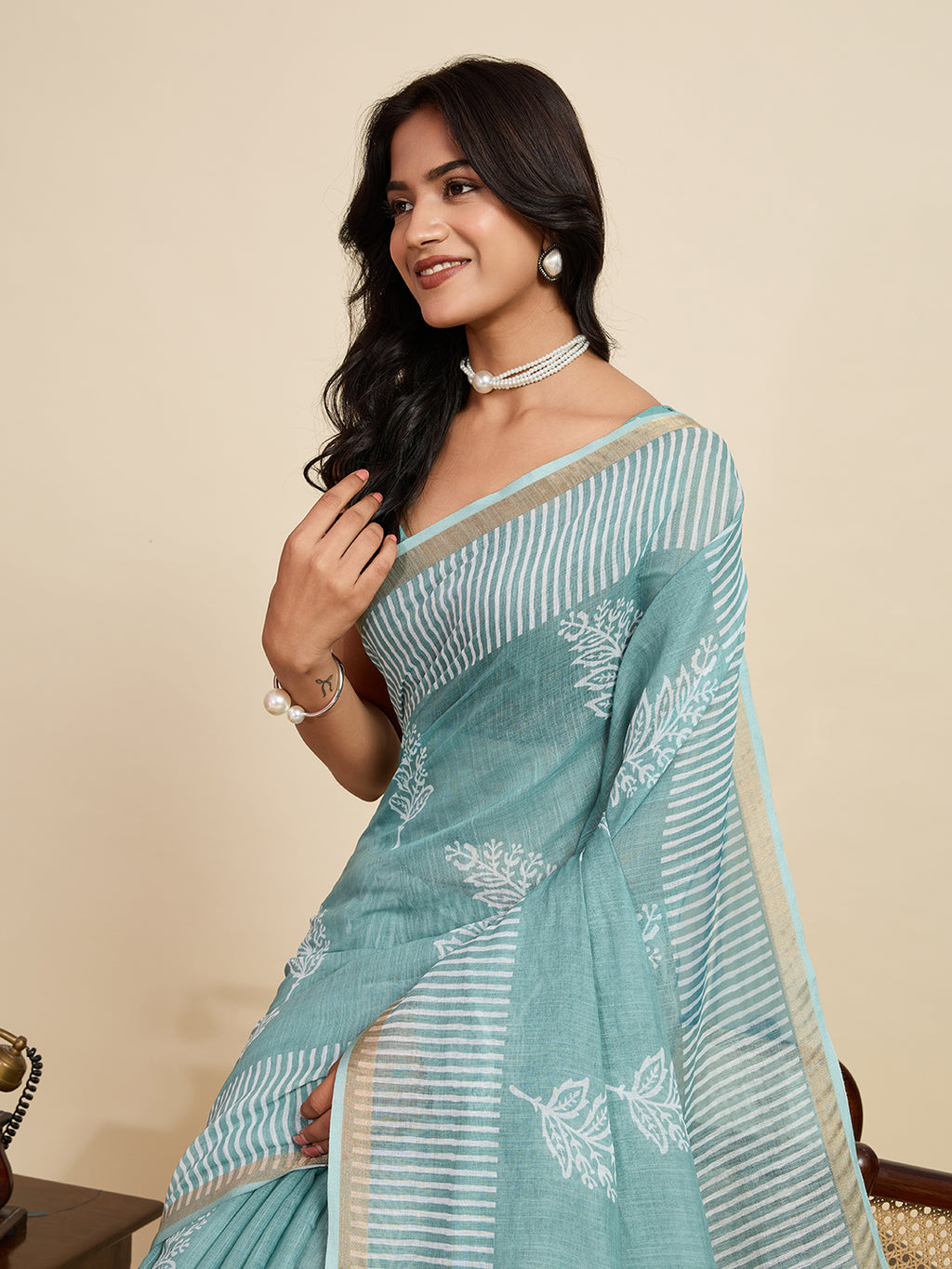 Sea green linen cotton saree with digital printed work and silver zari border