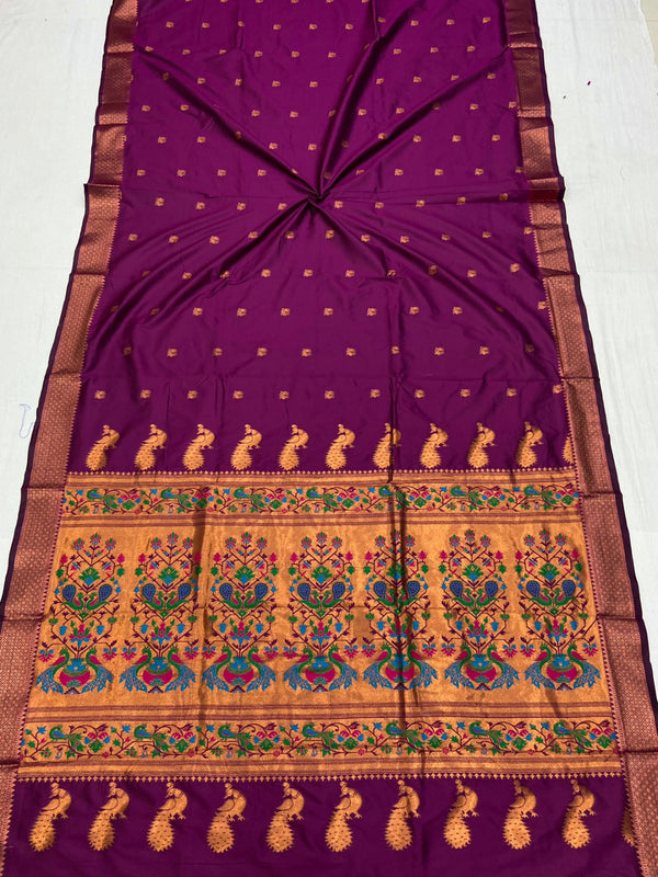 Magenta color paithani silk saree with zari weaving work