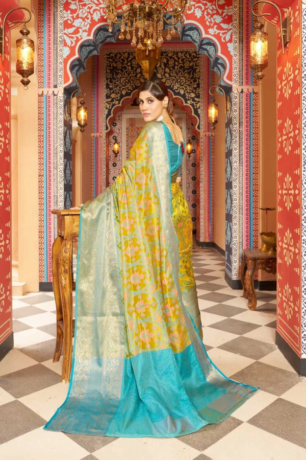 Yellow color soft organza silk saree with woven design