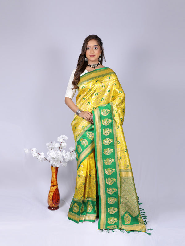 Yellow color kanchipuram silk saree with zari weaving work