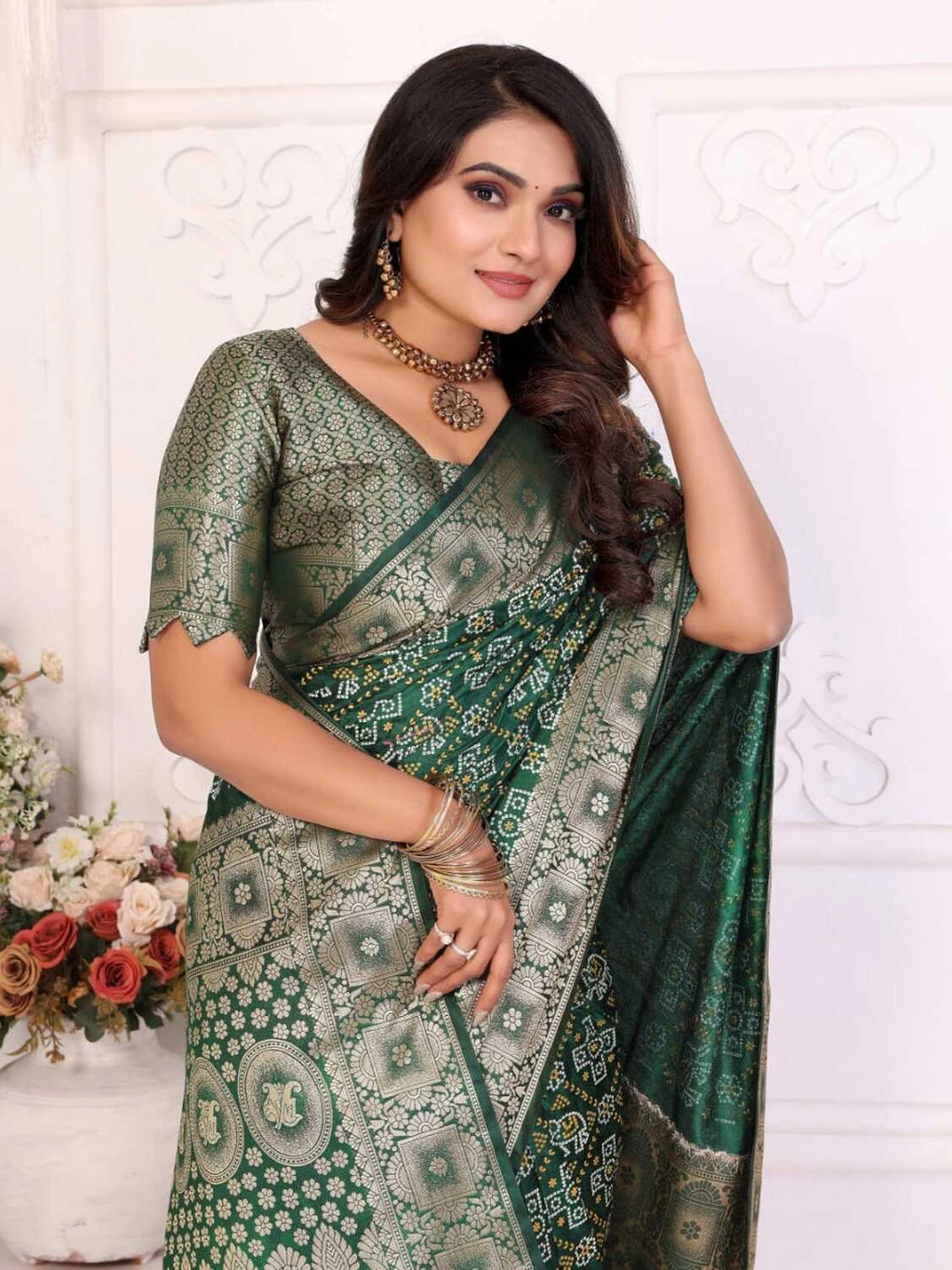 Green satin silk bandhej saree with zari weaving border & pallu