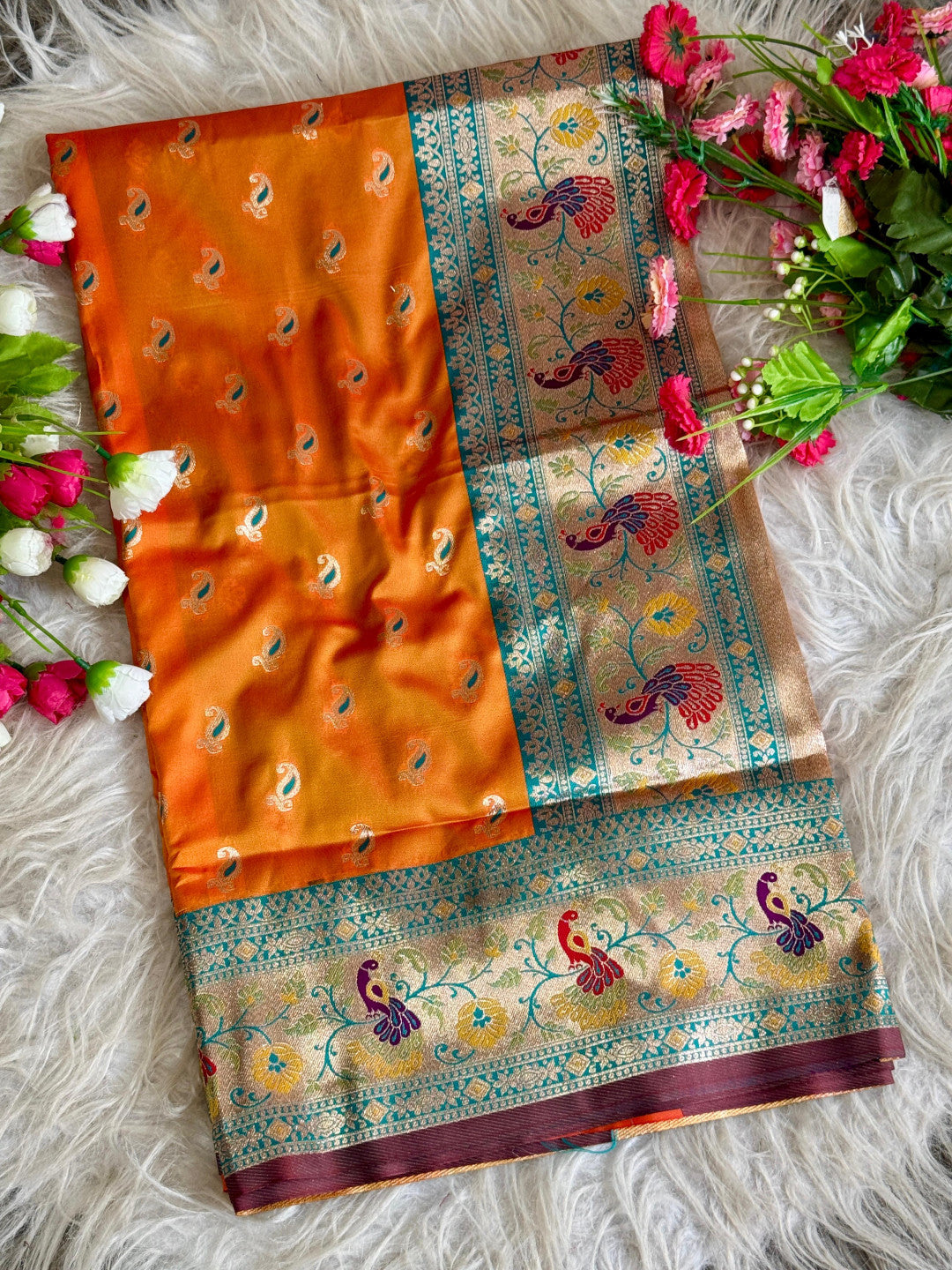 Orange traditional paithani silk saree with peacock zari weaving work