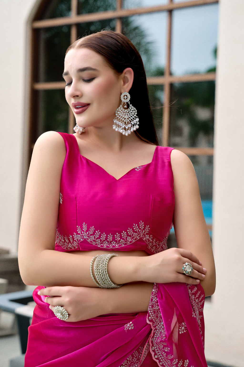 Pink fancy shimmer chiffon saree with embroidery work