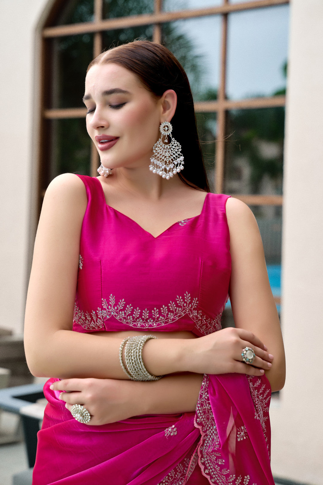 Pink fancy shimmer chiffon saree with embroidery work