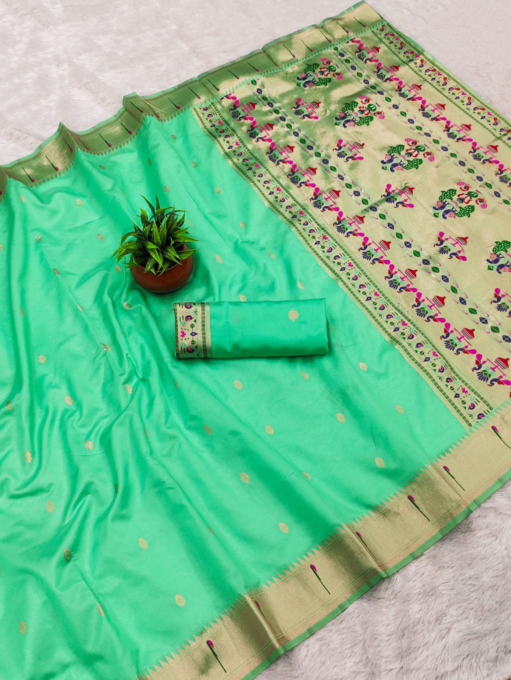 Sea green lichi silk paithani saree with copper zari weaving work
