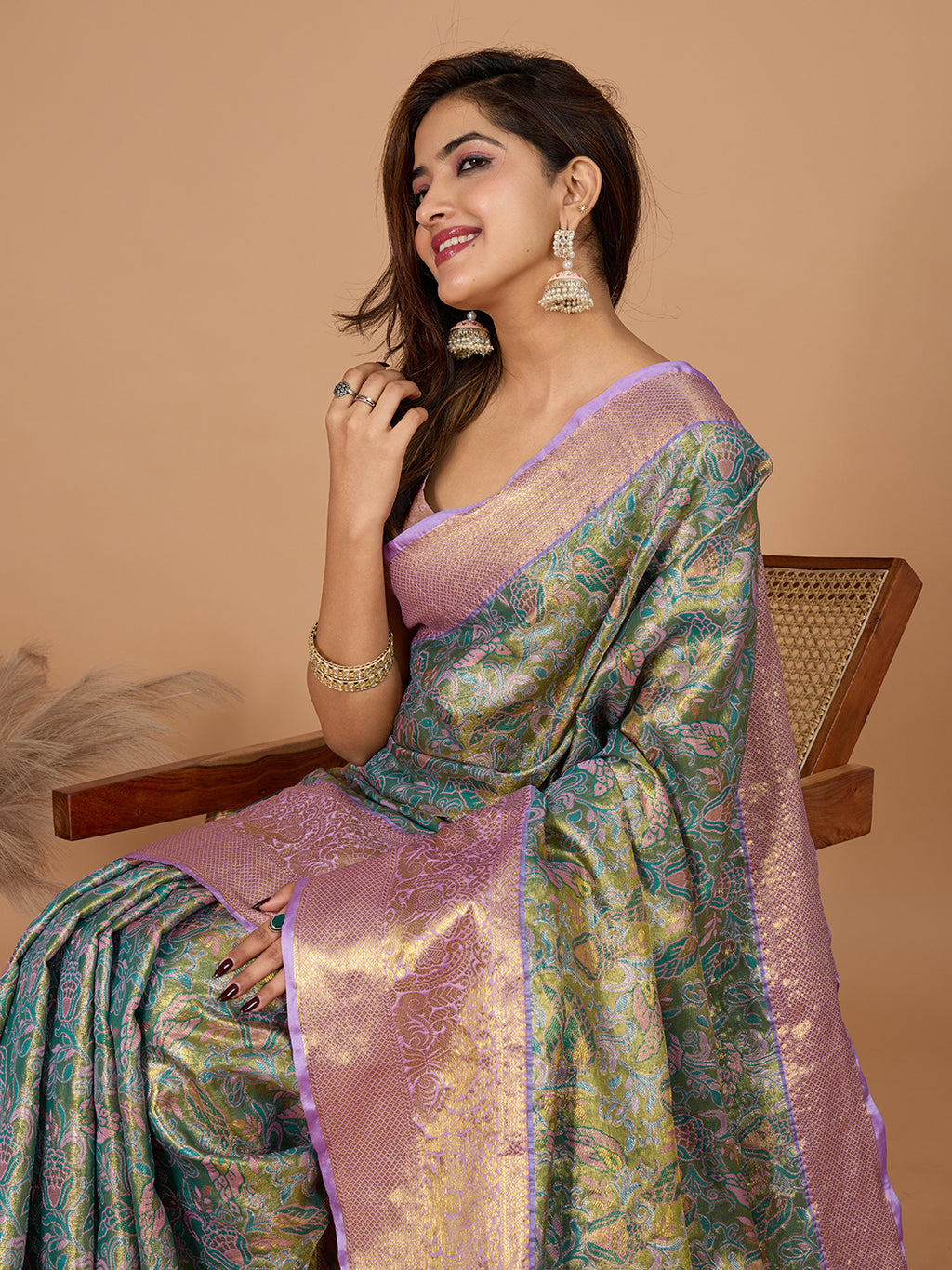 Green kanjivaram silk saree with zari weaving work