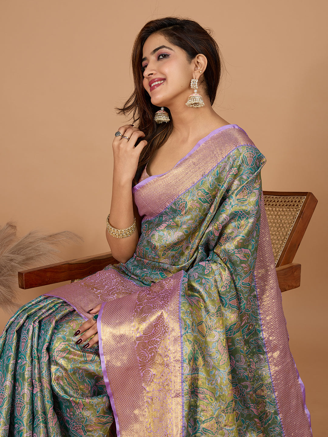 Green kanjivaram silk saree with zari weaving work