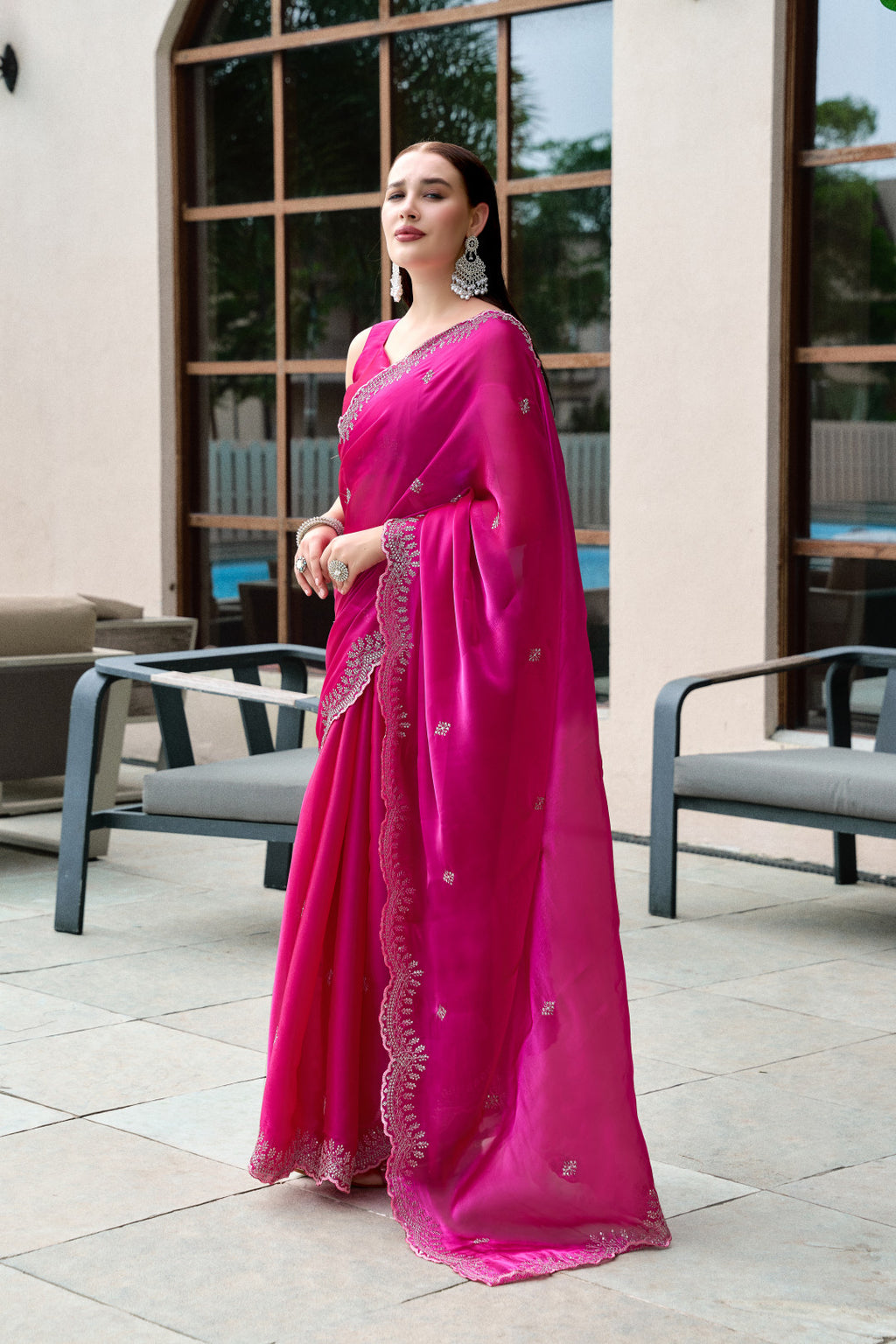 Pink fancy shimmer chiffon saree with embroidery work