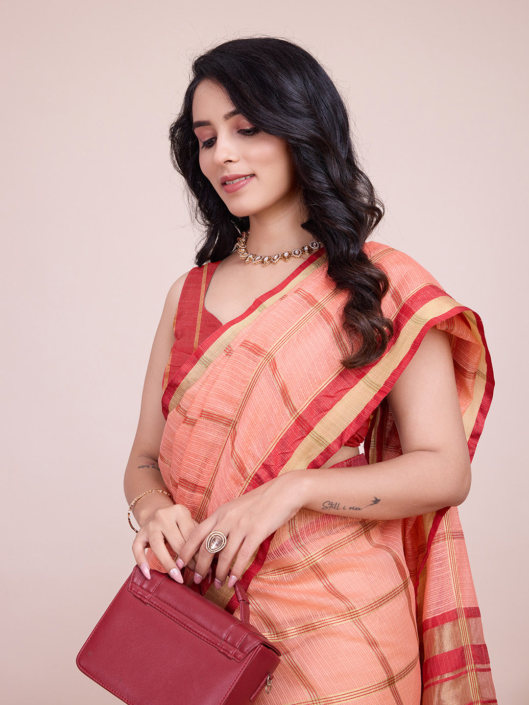 Peach kota doriya saree with zari weaving work