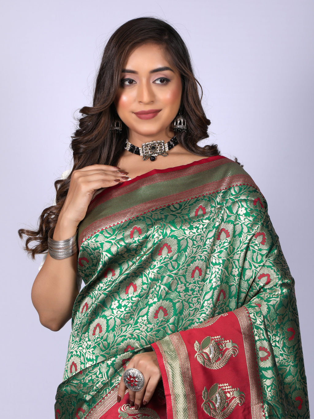 Green color kanchipuram silk saree with zari weaving work