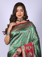 Green color kanchipuram silk saree with zari weaving work