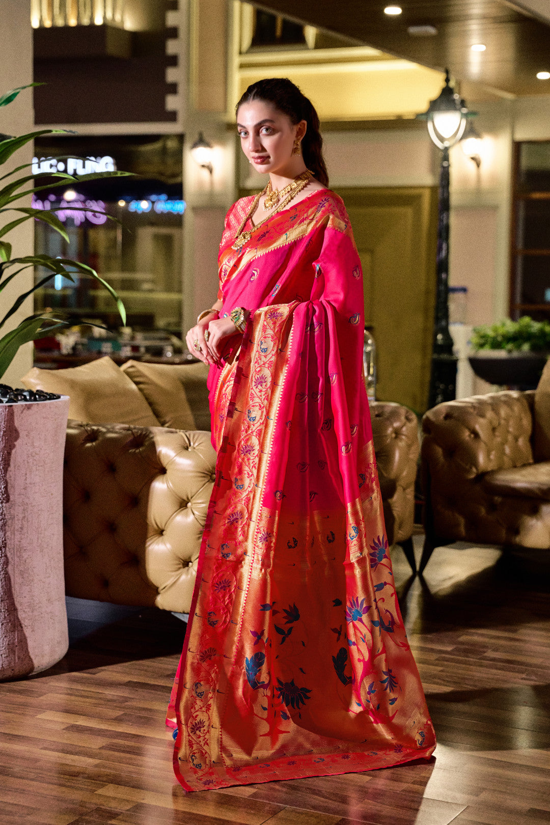 Traditional pink paithani silk saree with zari weaving work