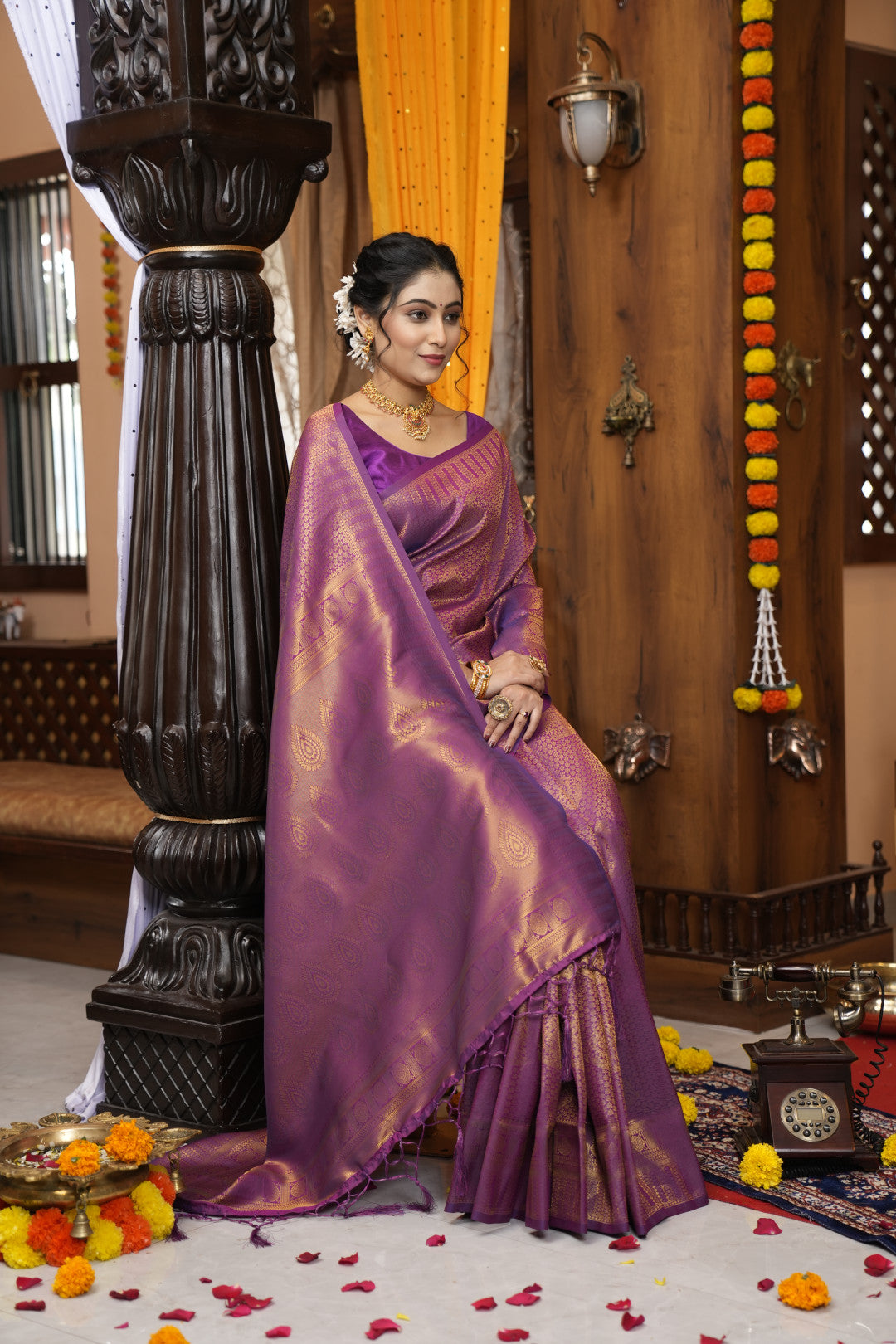 Purple color kanjivaram silk saree with zari weaving work