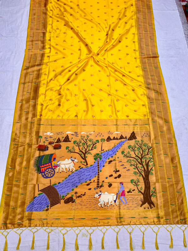 Yellow color paithani silk saree with zari weaving work