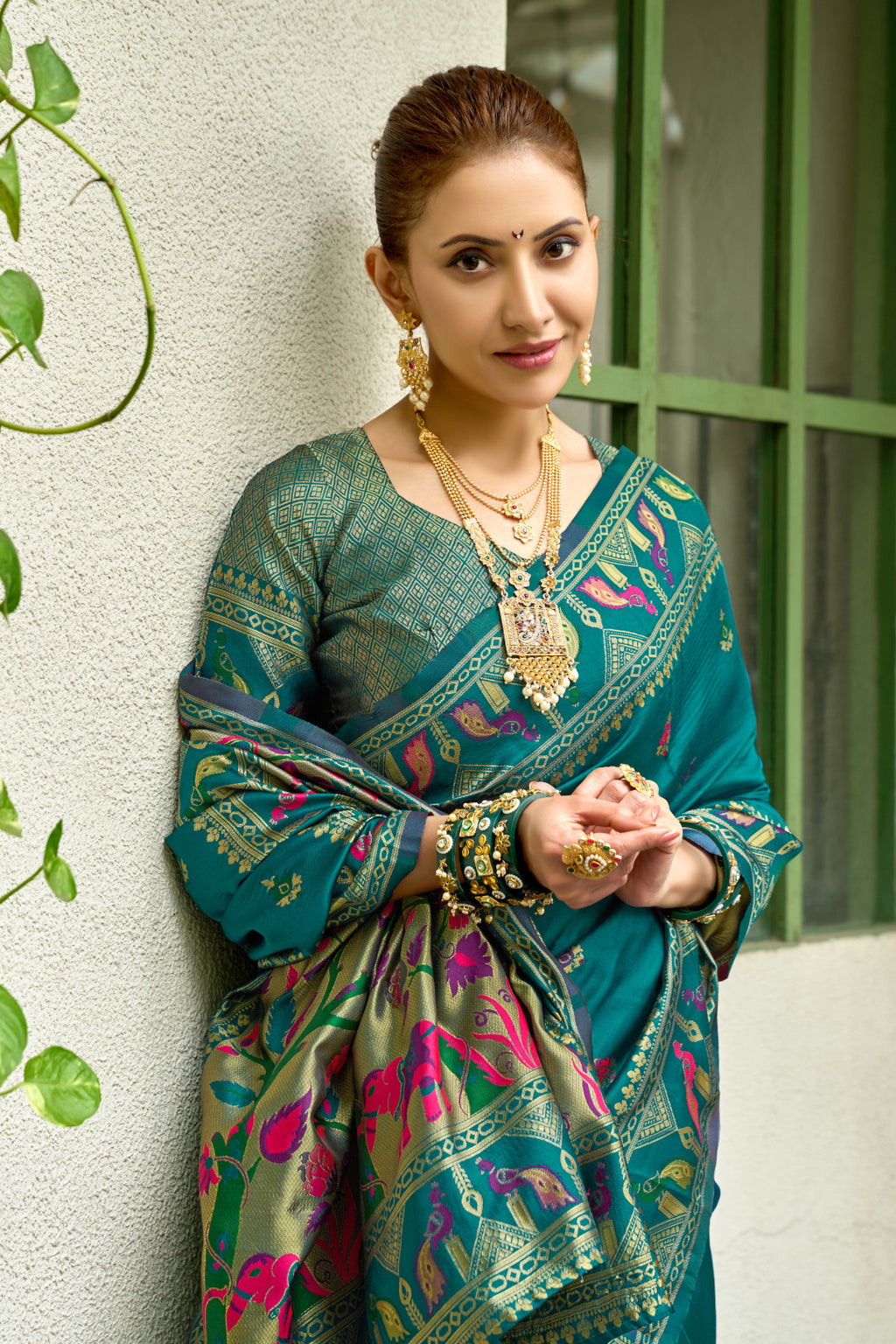 Traditional rama green paithani silk saree with zari weaving work