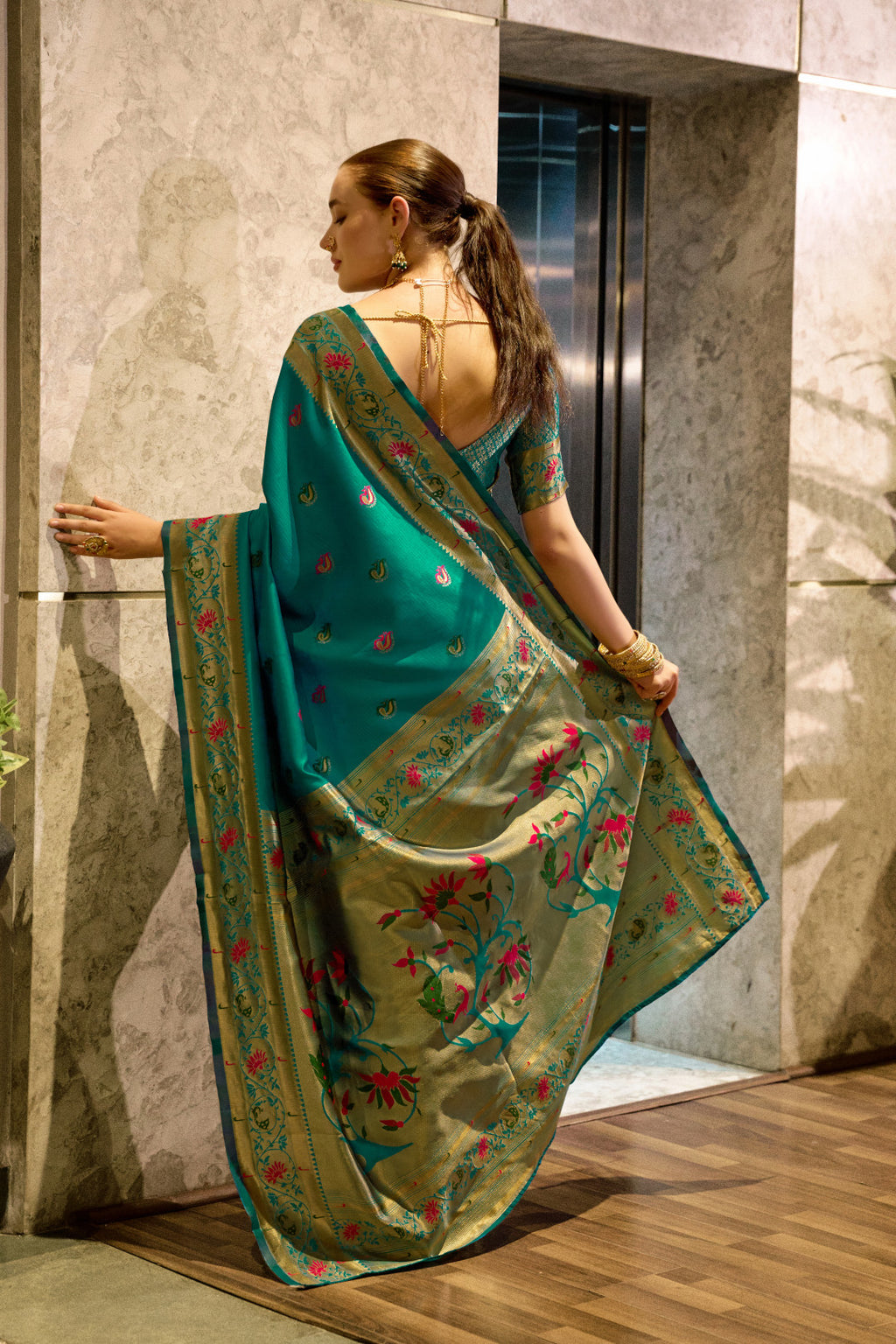 Traditional rama green paithani silk saree with zari weaving work