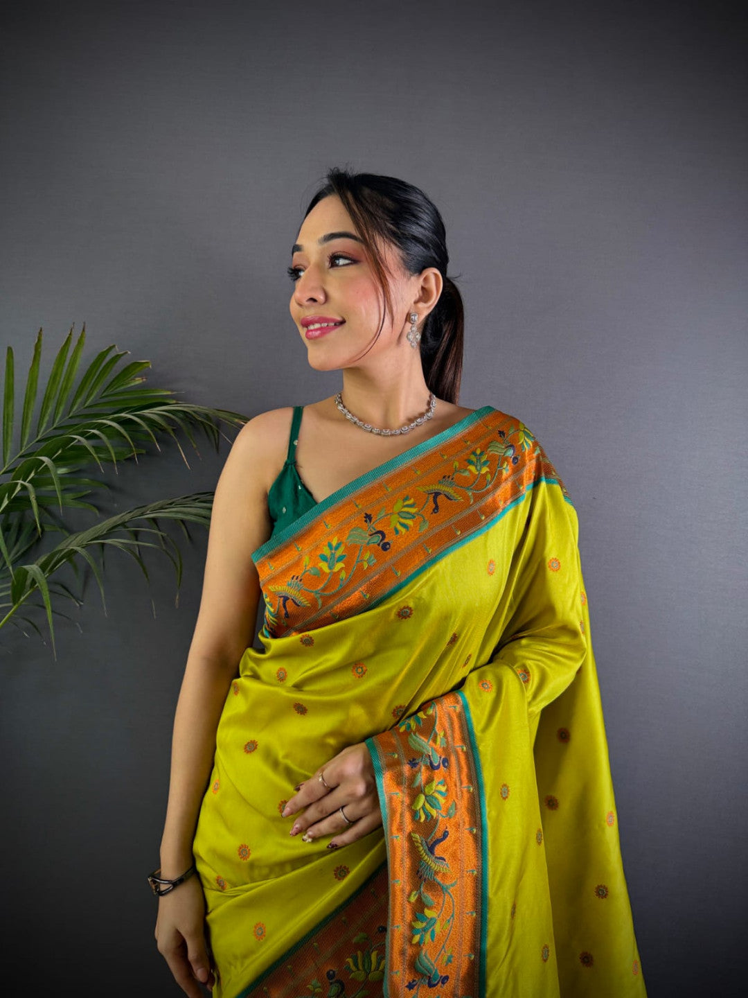 Parrot green colour paithani silk saree with zari weaving work