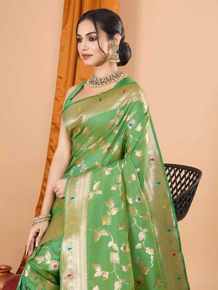 Pista green premium banarasi silk saree with meenakari zari weaving work