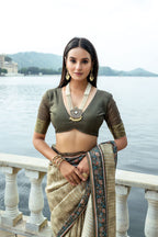 Mahendi green color soft tussar silk saree with zari weaving work