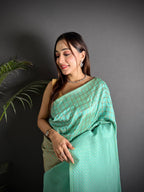 Sea green color banarasi silk saree with zari weaving work