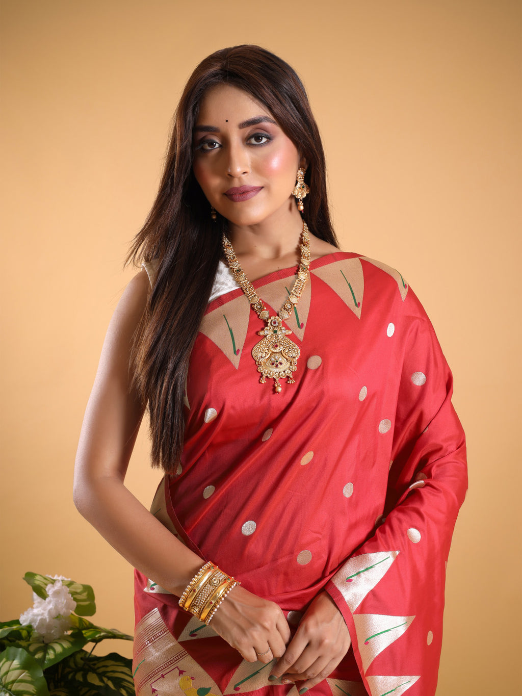 Red color paithani silk saree with zari weaving work