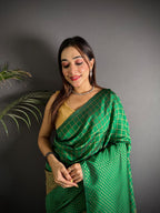 Green color banarasi silk saree with zari weaving work