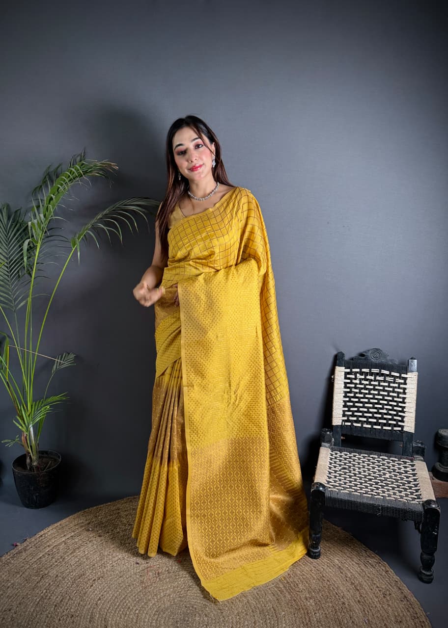 yellow color banarasi silk saree with zari weaving work
