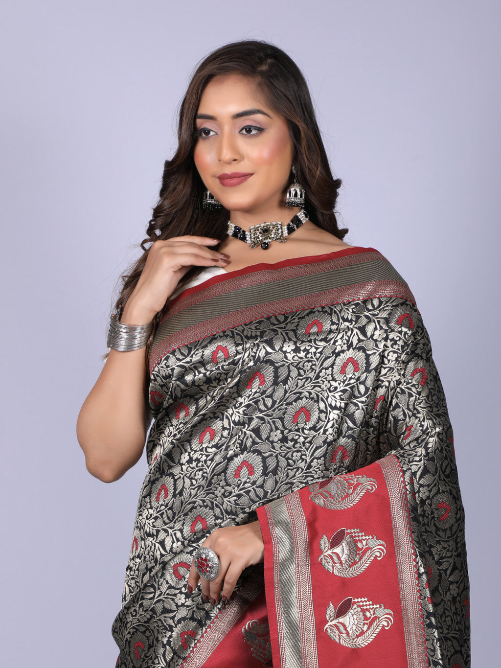 Black color kanchipuram silk saree with zari weaving work