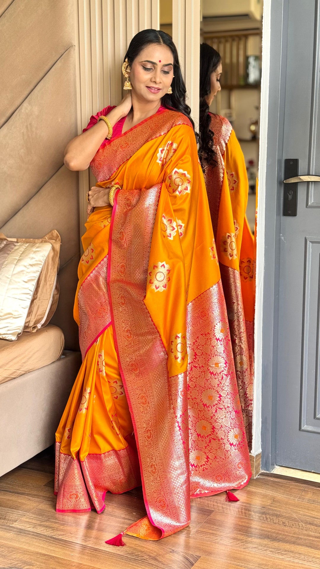 Orange luxurious banarasi silk saree with zari weaving work