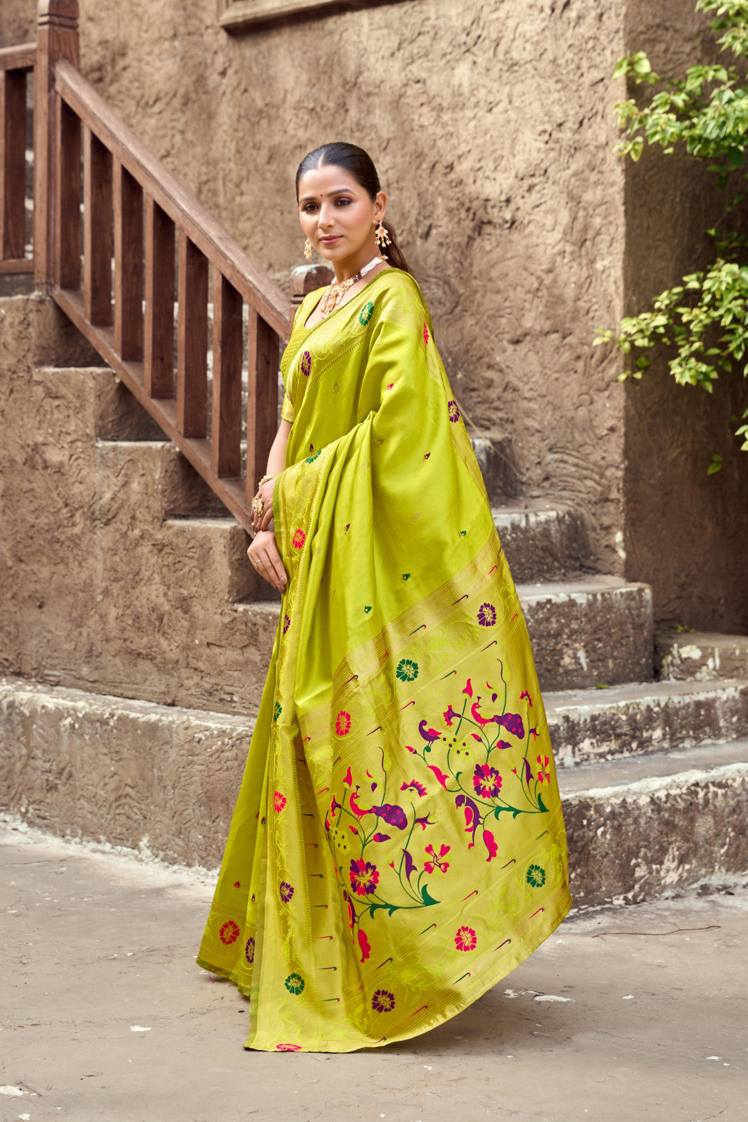 Traditional parrot green paithani silk saree with zari weaving work