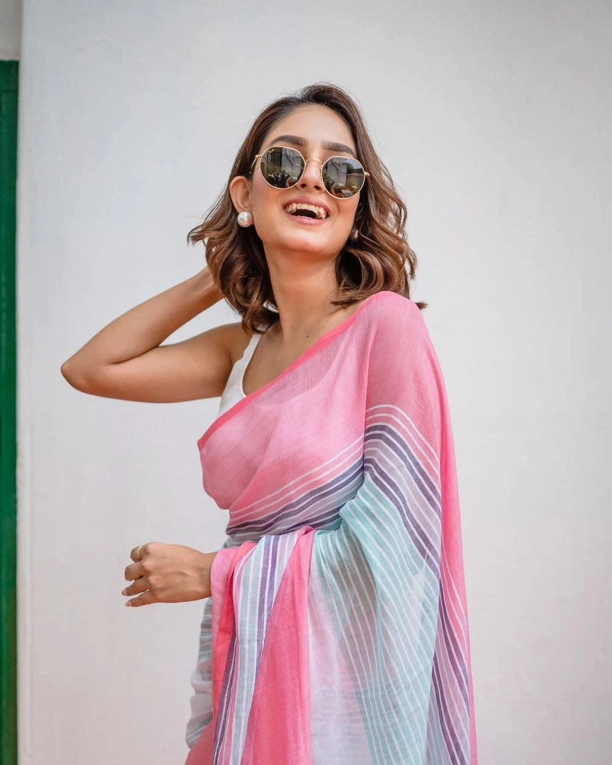 Multi colour soft flowy linen cotton saree with digital printed work