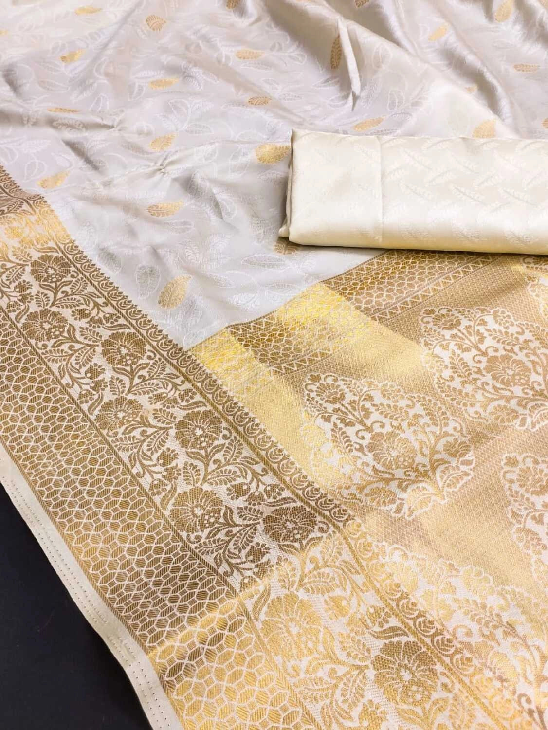 Off white soft banarasi silk saree with zari weaving work