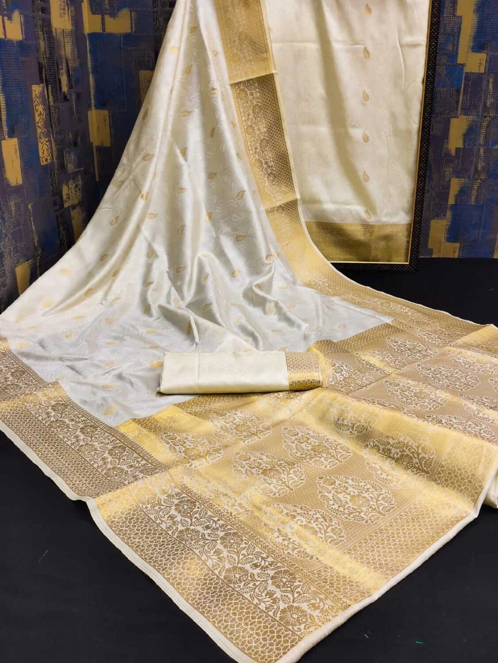 Off white soft banarasi silk saree with zari weaving work