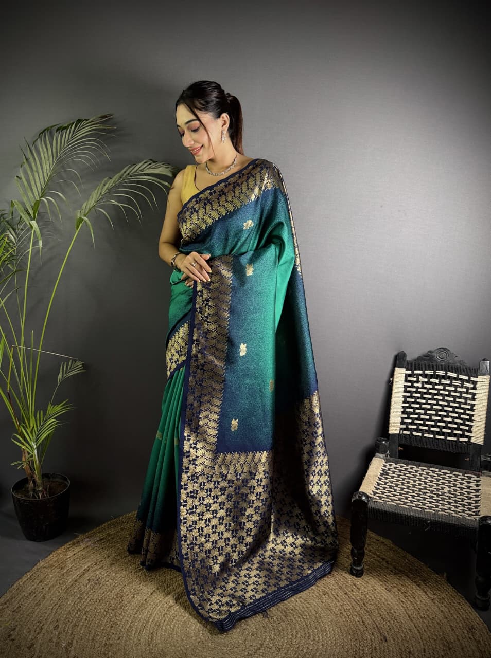 Rama green color banarasi silk saree with zari weaving work